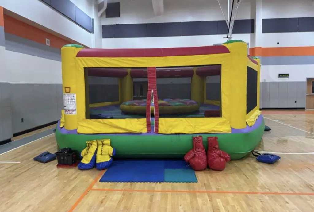 Colorful inflatable boxing ring setup
