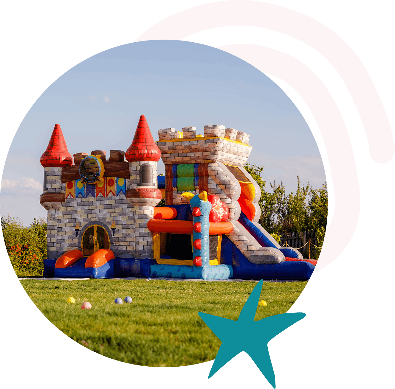 Colorful inflatable castle on grass